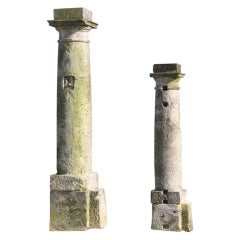 Stone gate piers dated early 17th century.